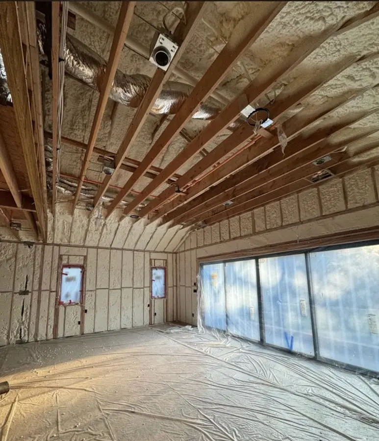 Interior walls and ceiling insulated with spray foam during new construction in Cinco Ranch